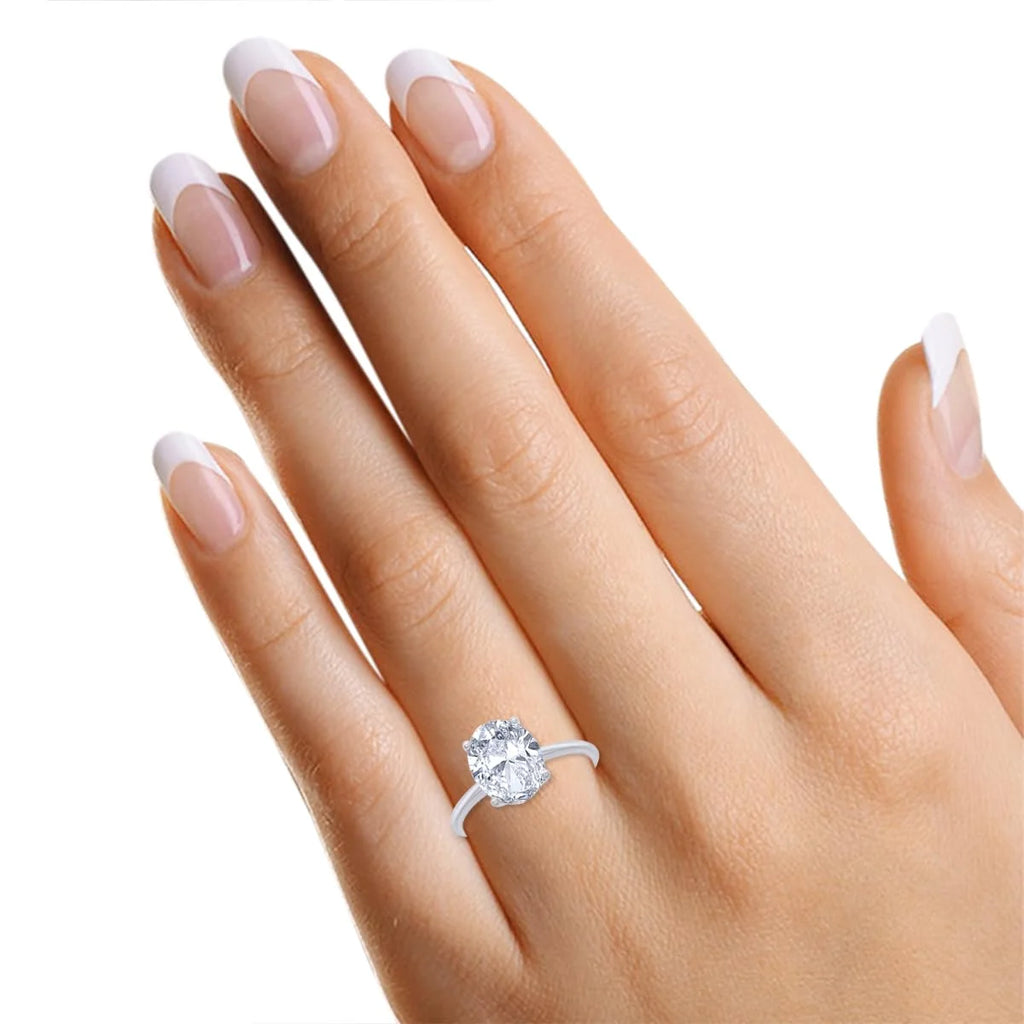 Oval Cut Solitaire Lab Created Moissanite Wedding Ring in 14K White Gold Over Sterling Silver N26206